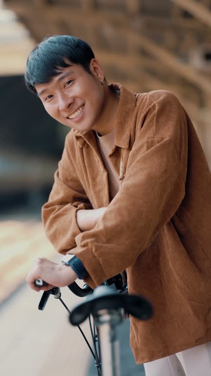 Asian young man travel with bicycle