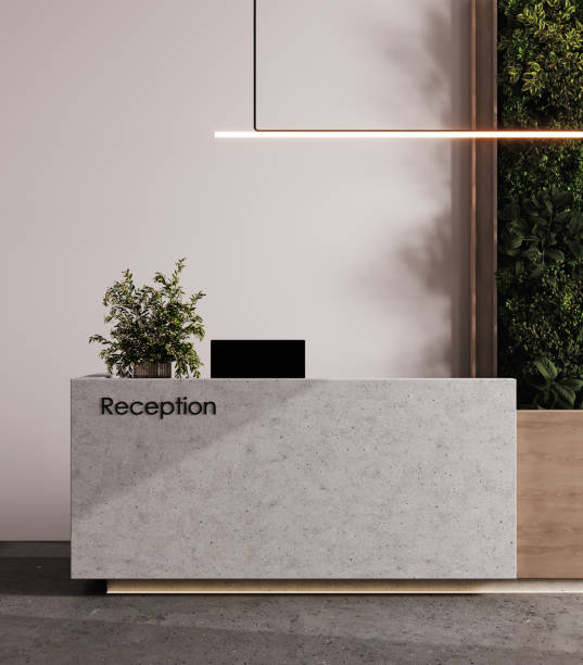 istock Concrete reception counter in modern room with light white walls. Blank registration desk in hotel, spa or office. Reception mock up with copy space for branding, logo, 3D rendering 1977650678