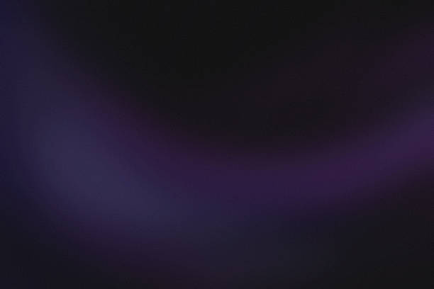 istock Black violet blue bokeh, simple grainy noise grungy empty space or spray texture, abstract retro vibe shine bright light and glow background template color gradient 1977652766