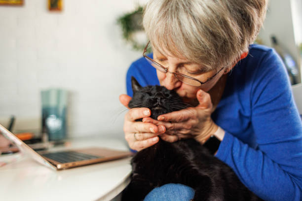 istock Woman Bonding With Her Black Cat 1977662362