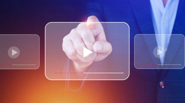 istock Businessman hands using for streaming online, watching video on internet, live concert, show or tutorial, content online. 1977676261