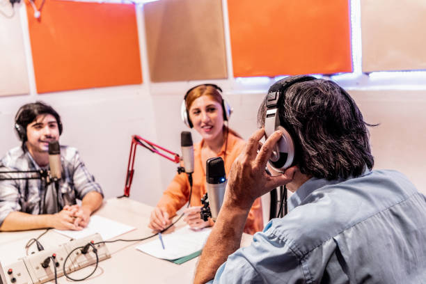 istock Presenters talking on a radio show 1977678961