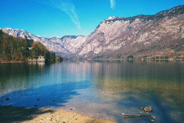 Mountain lake with reflection. Lake Bohinj, Slovenia.