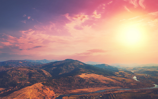 Top view of colorful mountain slopes and river Stryi at sunset. Beautiful landscape. Carpathians, Carpathian Ruthenia, Ukraine