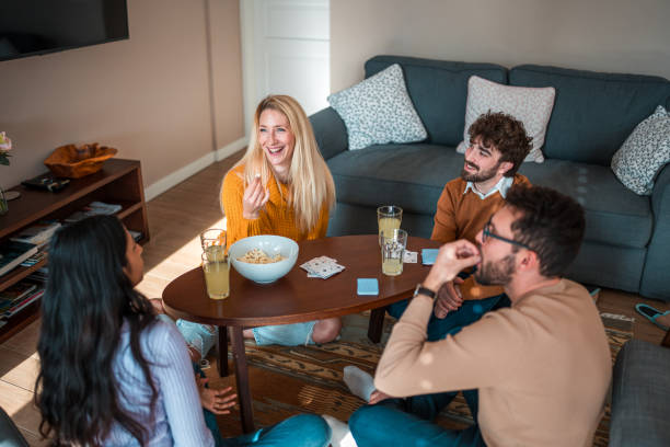 istock Diverse Group of Friends Enjoying Home Gathering 1977796927