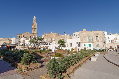 Monopoli, Italy - October 30, 2023: City of Monopoli behind fortified wall, Puglia, Italy