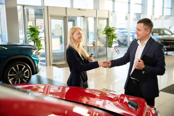 istock Sales manager shaking hand of young lady 1977801230