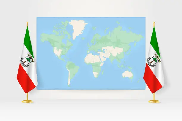 Vector illustration of World Map between two hanging flags of Equatorial Guinea flag stand.