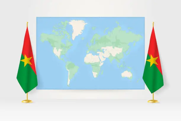 Vector illustration of World Map between two hanging flags of Burkina Faso flag stand.