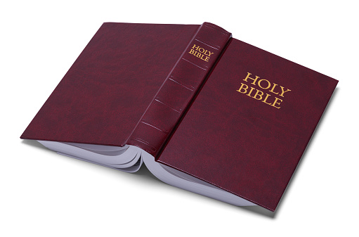 Red Open Holy Bible Cut Out on White.