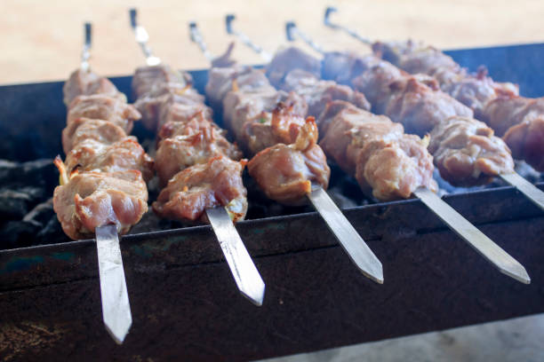istock Meat skewers on barbecue grill 1977884950