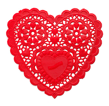 Red Paper Heart Doily Cut Out on White.