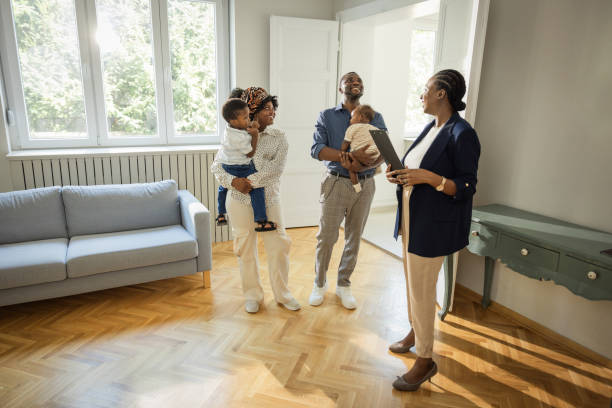 istock Young family buying house 1977947520