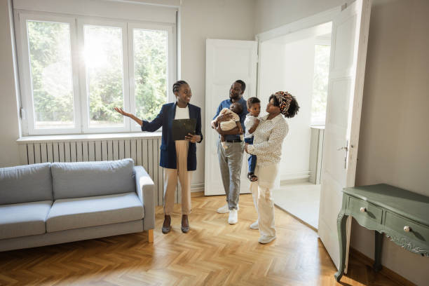 istock Young family buying house 1977948032
