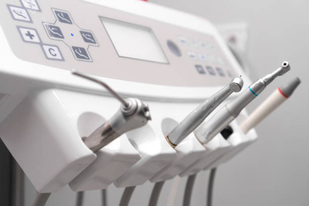 istock Close-up of dental instruments on a dental unit, selective focus. Various tips, ultrasonic scaler, surgical, endo- and periodontal tips. 1977974685