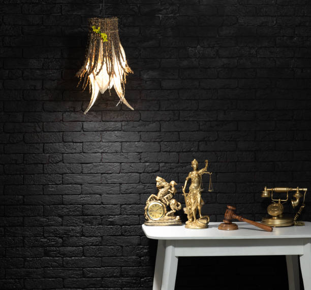 istock Law concept, Themis figurine on the table at night 1977992564