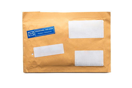Padded envelope top view isolated on white background, cardboard bag, package paper letter.