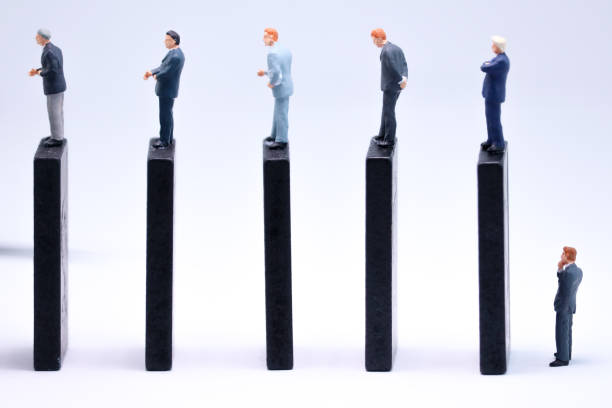 istock Corporate Hierarchy and Performance Metrics Concept with Miniature Figures 1978032238