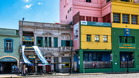 Buenos Aires, Argentina - Dec 16, 2023: Colorful buildings in Caminito street in La Boca neighborhood at Buenos Aires, Argentina. It was a port area where Tango was born