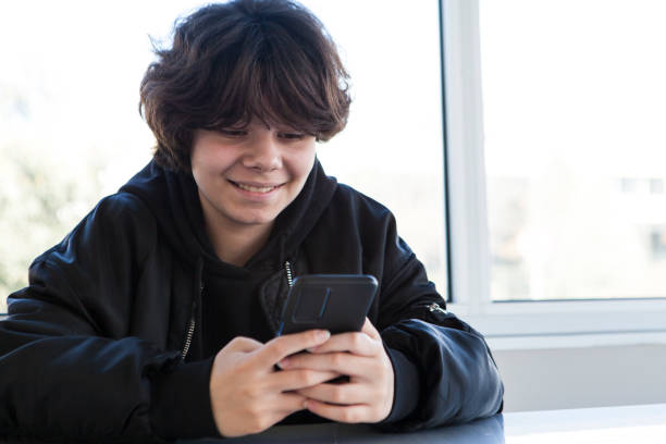 istock The teenager communicating with her friends using her smartphone. 1978067370