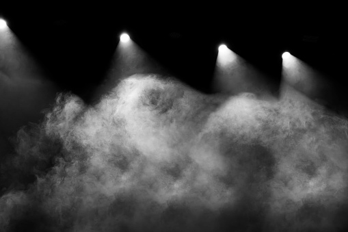 Stage lights with smoke clouds fog empty stage textured.