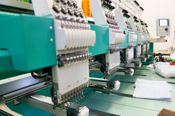 istock multi head embroidery machine, at work in a textile factory 1978158291