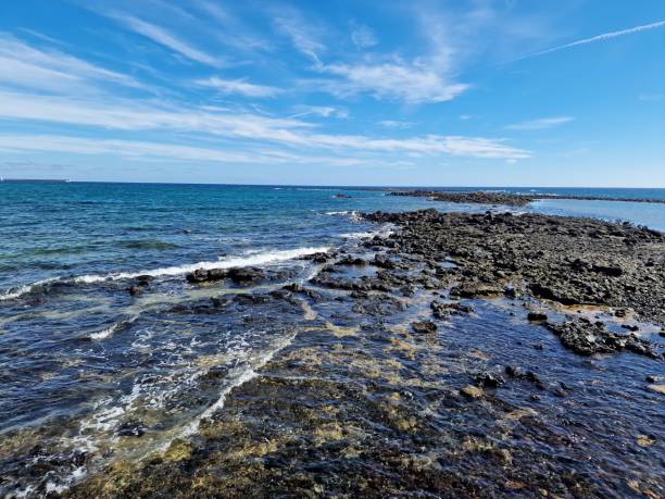 istock Strolling along the seaside promenade in Arrecife, Lanzarote 1978179678