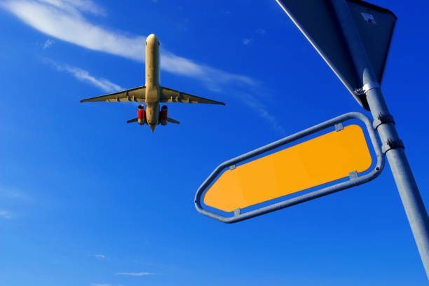 travel destination sign with a passenger airplane