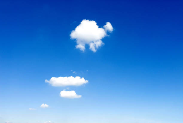 a small cumulus cloud in the blue sky