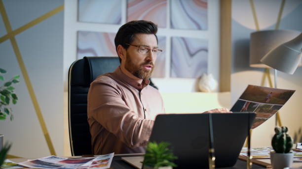 istock Annoyed manager speaking video meeting in office close up. Angry boss gesturing. 1978220582