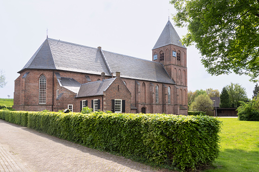Reformed church from the 14th century in the Dutch village of IJzendoorn in Gelderland.