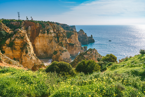 Picturesque cliff walk along the Lagos coastline in Algarve, Portugal