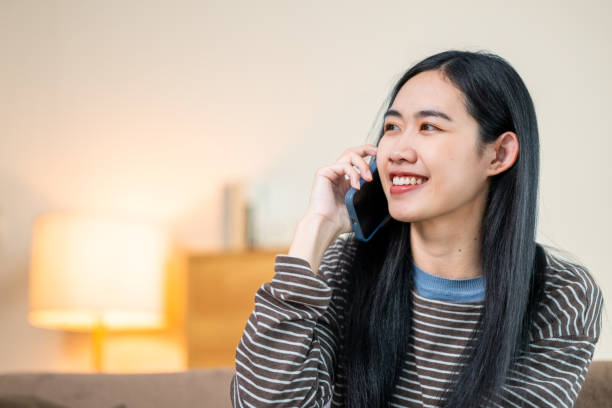 istock woman communicating Talk on the phone 1978358896