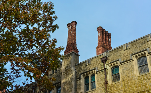 PRINCETON, NJ USA - NOVENBER 12, 2019:  chimneys, Blair Hall, the building of the educational building and the element of architectural design on the walls at Princeton University. New Jersey