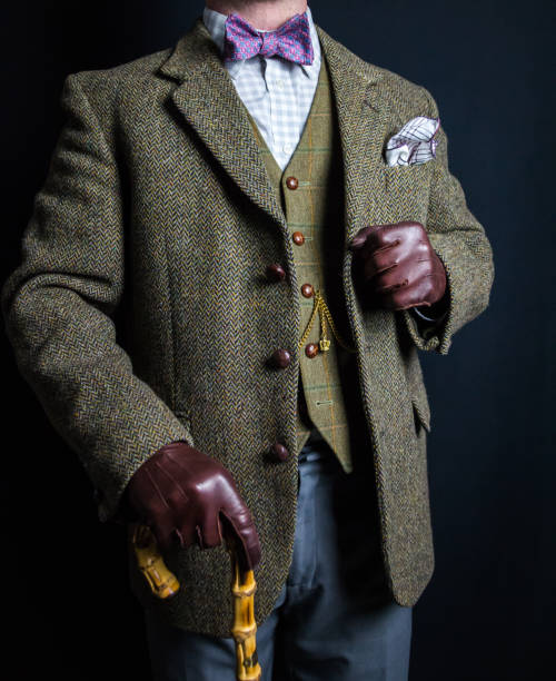 istock British Gentleman in Tweed Suit Holding Umbrella 1978372786
