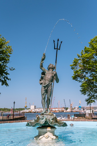 Portsmouth, NH, USA. July 12, 2023: Statue of Young Neptune, Prescott Park in seaside tourist city in New England.
