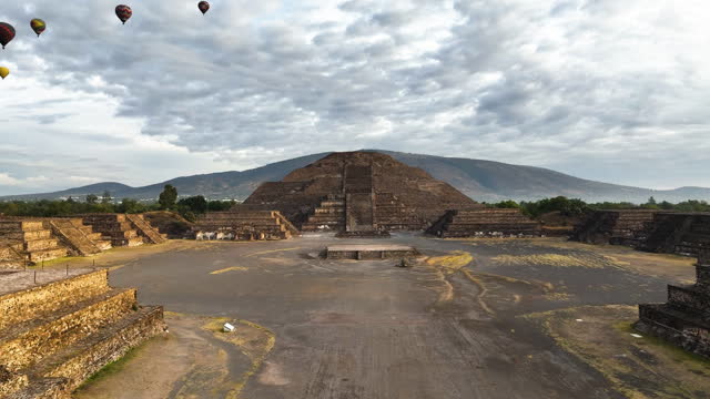 Drone shot toward the Pyramid of the moon, golden hour in Teotihuacan, Mexico