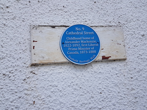 Information sign noting the childhood home of Alexander Mackenzie, Prime Minister of Canada during 1873 till 1880,  Dunkeld, Perth and Kinross, Scotland, England UK