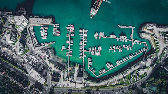 Aerial view of Newhaven industrial port with visible ships and yachts in town, Newhaven, East Sussex, UK
