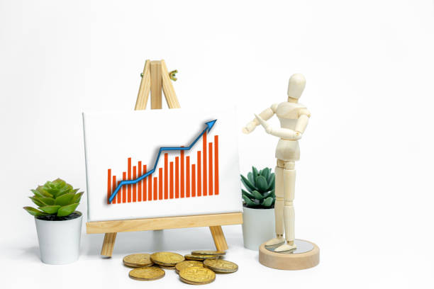 istock Mannequin drawing a graph charts on easel; isolated on white background; Business or finance concept 1978746861