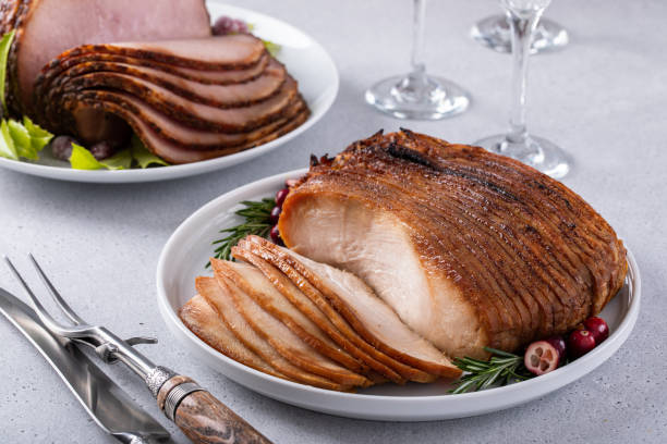 istock Oven roasted turkey breast thinly sliced with side dishes for a celebration dinner 1978754588