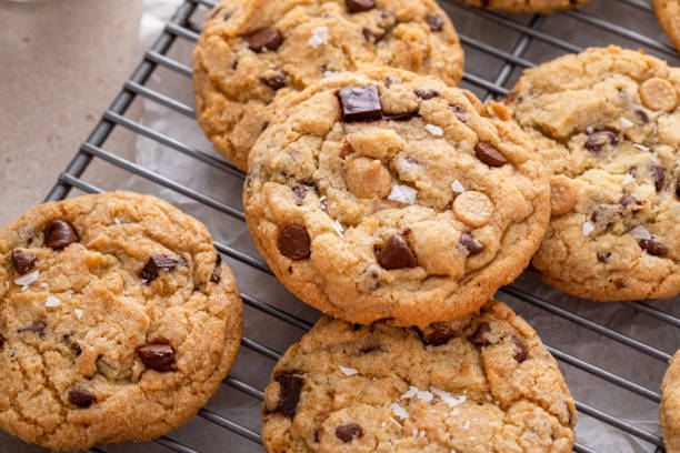 istock Chocolate chip cookies on a cooling rack with flaky salt served with milk 1978755624