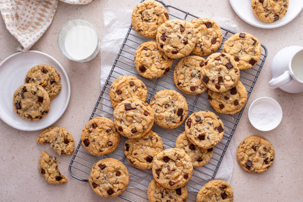 istock Chocolate chip cookies on a cooling rack with flaky salt served with milk 1978755625