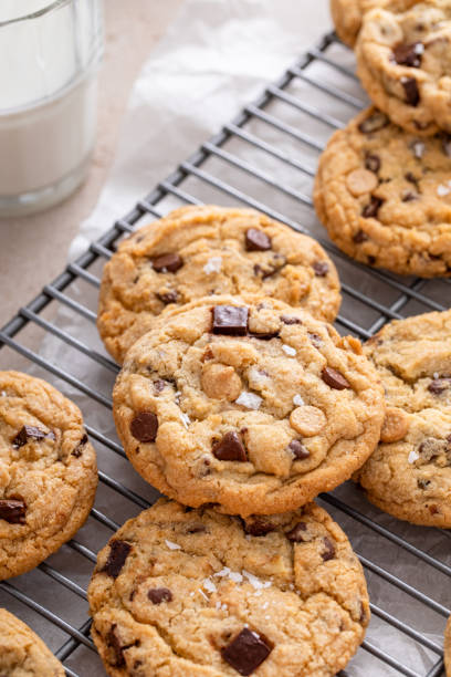 istock Chocolate chip cookies on a cooling rack with flaky salt served with milk 1978755626