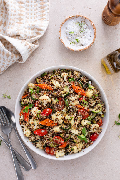 istock Warm quinoa salad with roasted vegetables and fresh tomatoes 1978755628