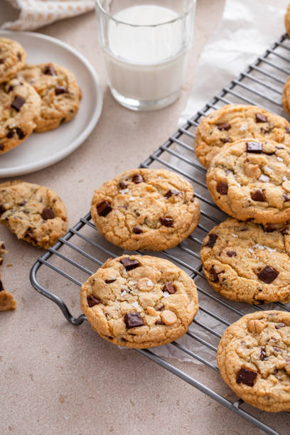 istock Chocolate chip cookies on a cooling rack with flaky salt served with milk 1978755633