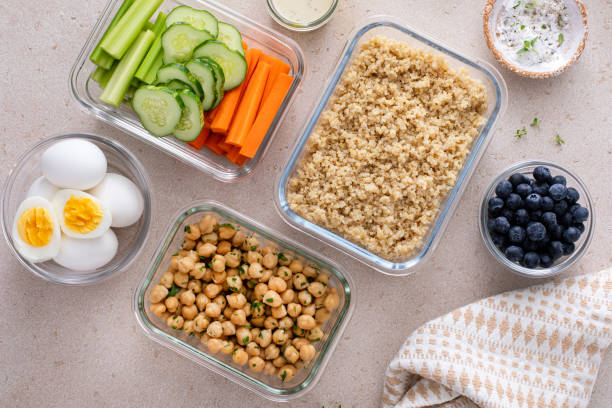istock Vegetarian lunch meal prep in containers, high protein with quinoa, herbed chickpeas, vegetables and boiled eggs 1978755658