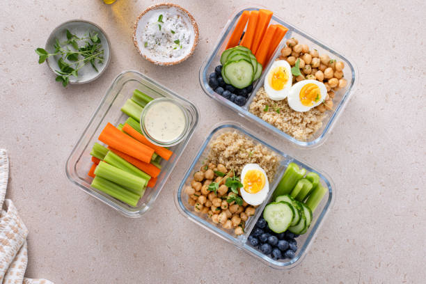 istock Vegetarian lunch meal prep containers high protein with quinoa, herbed chickpeas, vegetables and eggs 1978756184