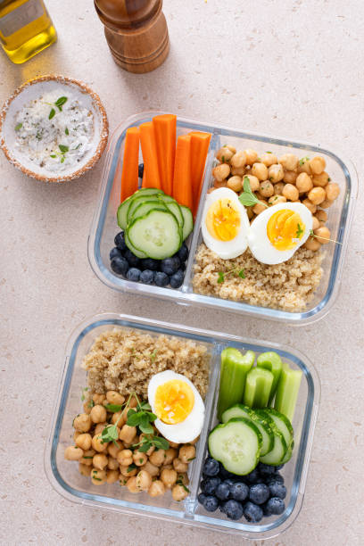 istock Vegetarian lunch meal prep containers high protein with quinoa, herbed chickpeas, vegetables and eggs 1978756187