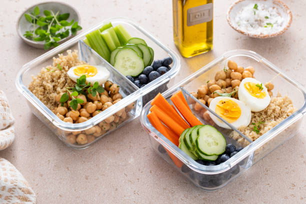 istock Vegetarian lunch meal prep containers high protein with quinoa, herbed chickpeas, vegetables and eggs 1978756190
